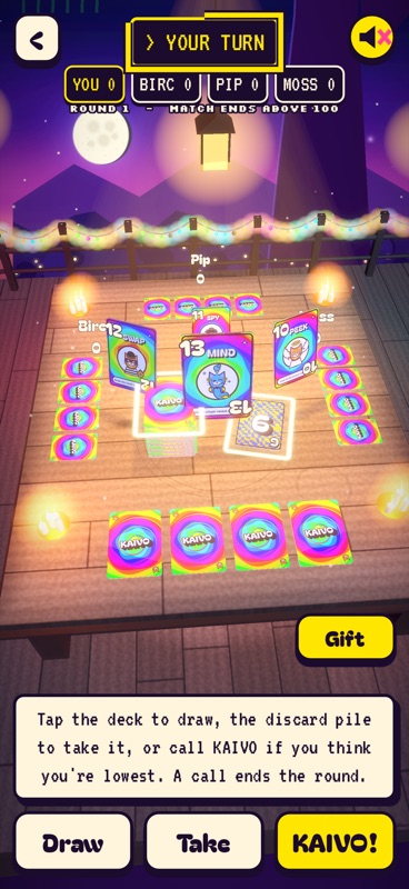 The Kaivo table at night with cards, string lights and candles